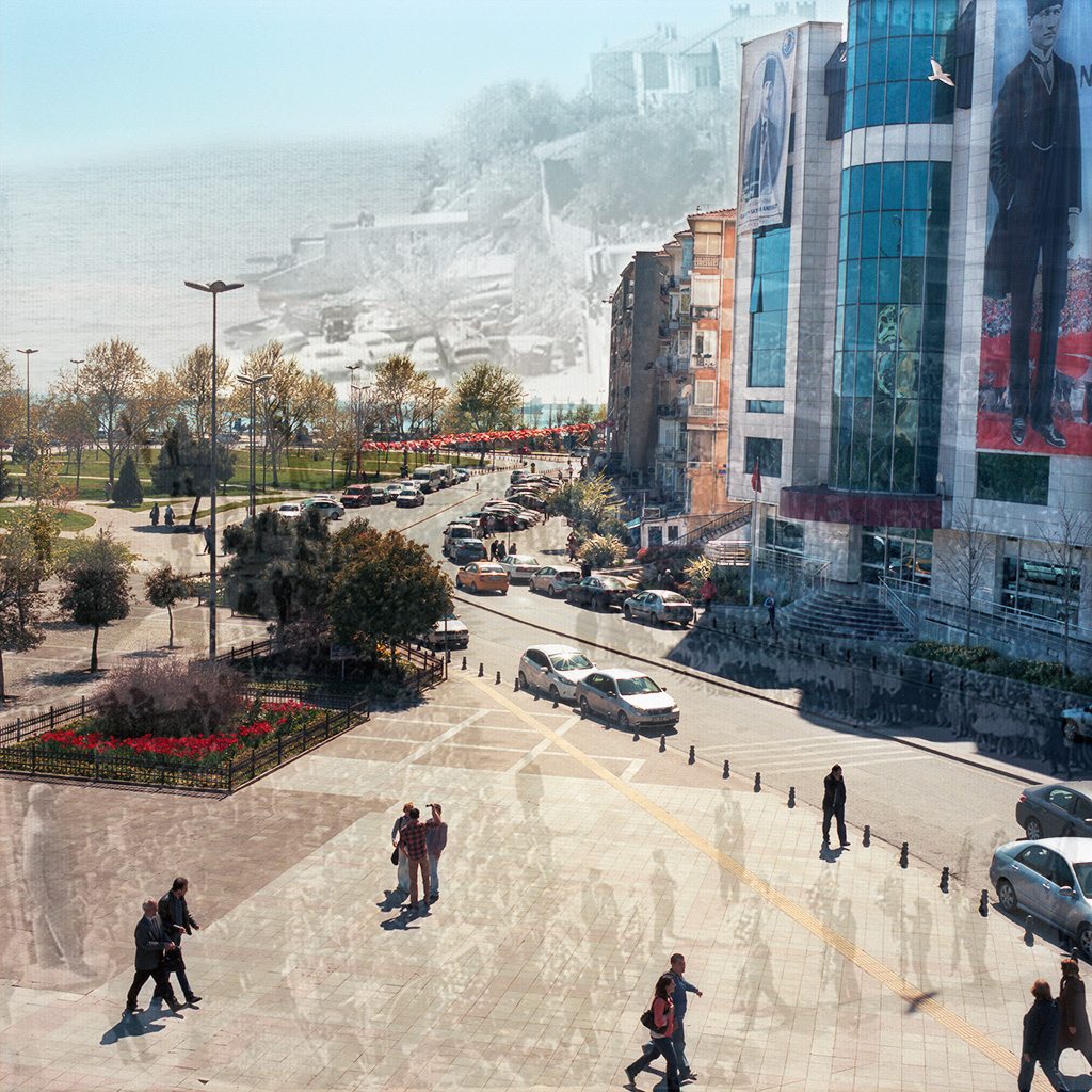 Kartal Meydanı, Kartal (Istanbul), Turquie. Palimpseste façonné à partir de mon image de la Place de Kartal (2014) et d’une image N&B montrant cette même place lors d’une Fête de la République dans les années 1960 (archives de la Mairie de Kartal, collection Studio Çiçek). Située sur la rive asiatique d’İstanbul, Kartal a entrepris de nombreux travaux de développement urbain et d’infrastructure routière afin de devenir une ville « moderne ». La Place de Kartal était beaucoup plus modeste, sur les bords de la Mer de Marmara, avec des bâtiments d’un étage construits sur une colline surplombant une petite plage. Ces dernières années, de grands travaux de rénovation urbaine ont repoussé la mer d’une trentaine de mètres. La place a été transformée en large esplanade piétonnière bétonnée. Les travaux ont fait disparaître la plage et arasé la colline. Des immeubles et bâtiments modernes, dont la nouvelle Mairie, se sont matérialisés à leur place.
............................
Kartal Meydani, Kartal (Istanbul), Turkey. Palimpsest fashioned using my picture of Kartal Square (2014) and a B&W picture of the same square in the 1960s (courtesy the Kartal Mayor’s Office). The older picture shows a ceremony on the same square commemorating the founding of the Turkish Republic. In the ‘60s, the square was much smaller and right on the Sea of Marmara. There was a tiny beach at the foot of one-story buildings perched on a slight hill. In recent years, important urban development projects have pushed the Marmara Sea back in order to create a concrete esplanade. In the process, the beach disappeared, the hillside was levelled and modern buildings materialized, including a new City Hall. Kartal is located on Istanbul’s Asian side.